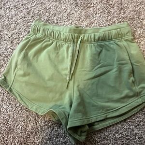 Green lululemon shorts, scuba like material